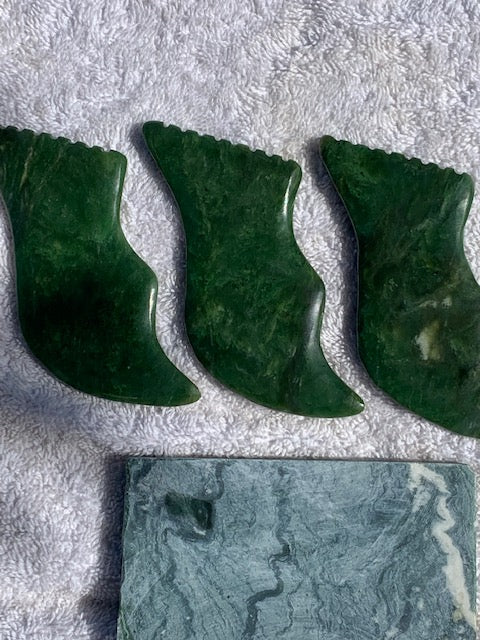 Raw Nephrite stone polished to a luxurious emerald green color. Buy Nephrite stones and guasha's, at AllResults skincare beauty and cosmetic sustainable containers