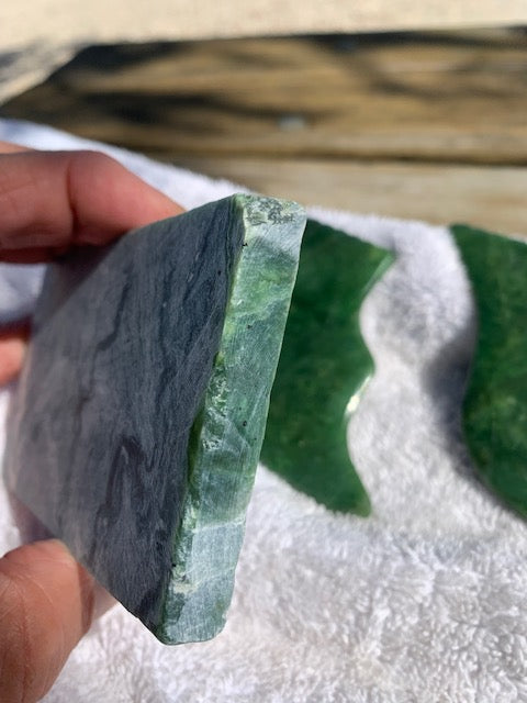 Raw Nephrite stone polished to an emerald green color. Buy Nephrite stones and guasha's, at AllResults skincare beauty and cosmetic  sustainable containers.
